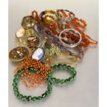 A collection of costume jewellery to include a pink coral thong necklace with barrel clasp fasting L
