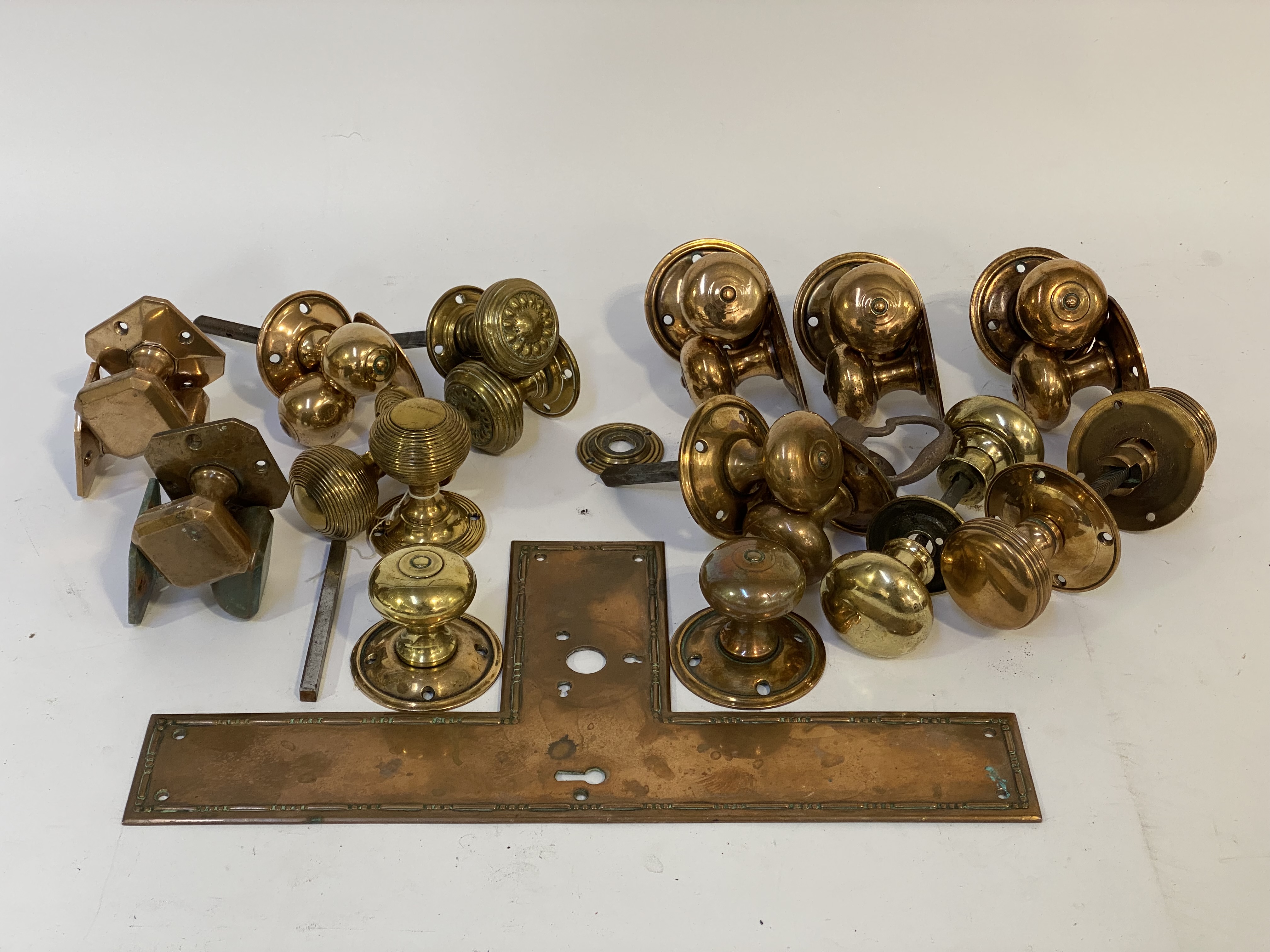 A quantity of mostly 19th century door furniture, to include a copper finger plate, a pair of - Image 2 of 3