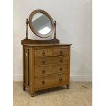 An early 20th century of dressing chest, with circular mirror above two short and three long