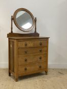 An early 20th century of dressing chest, with circular mirror above two short and three long