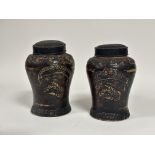 A near pair of Stoneware tobacco jars and towal/metal covers with Art Nouveau style grape vine