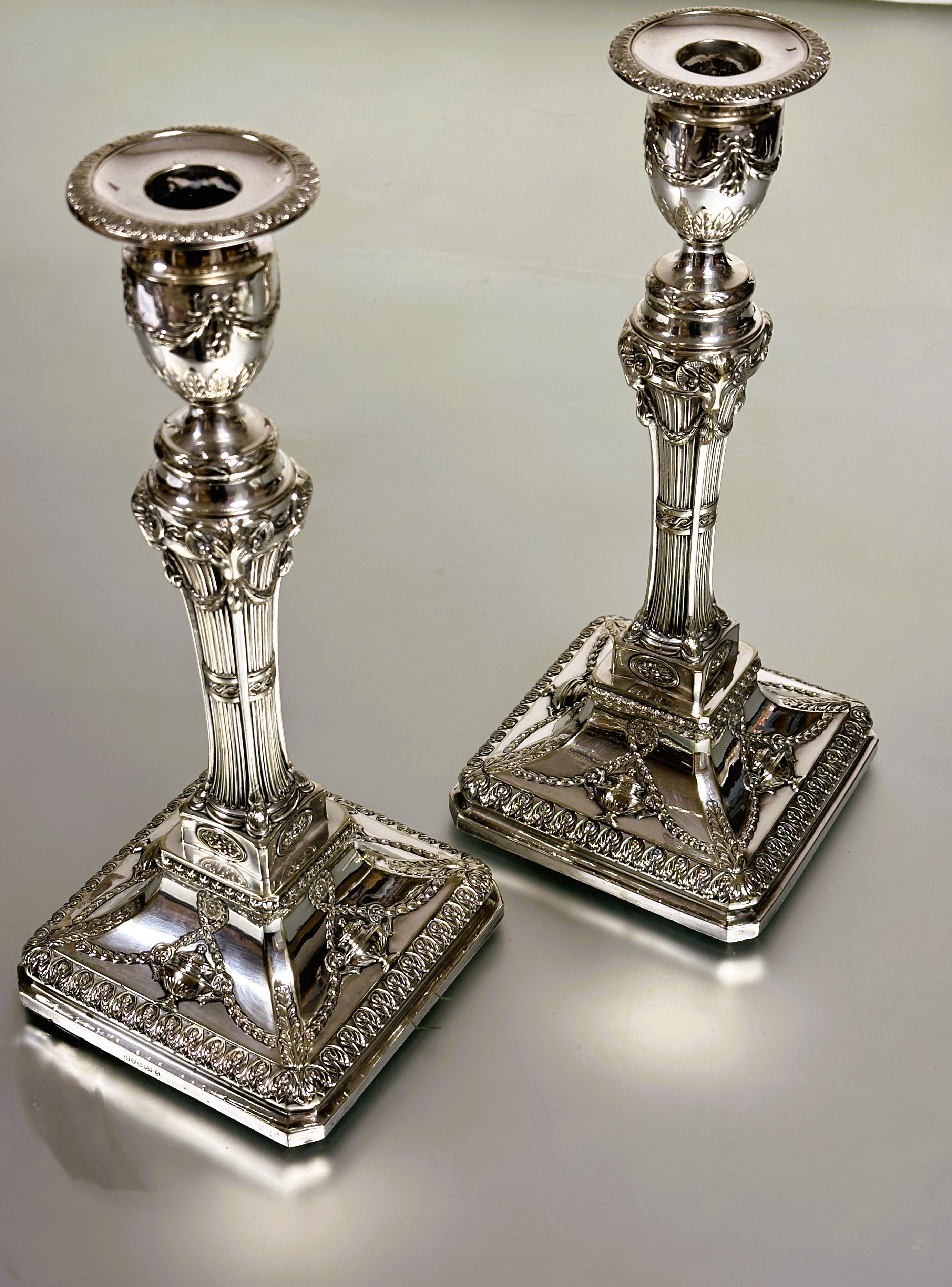 A pair of Edwardian Hawksworth, Eyre and Company fine quality Neo Classical Revival table candle