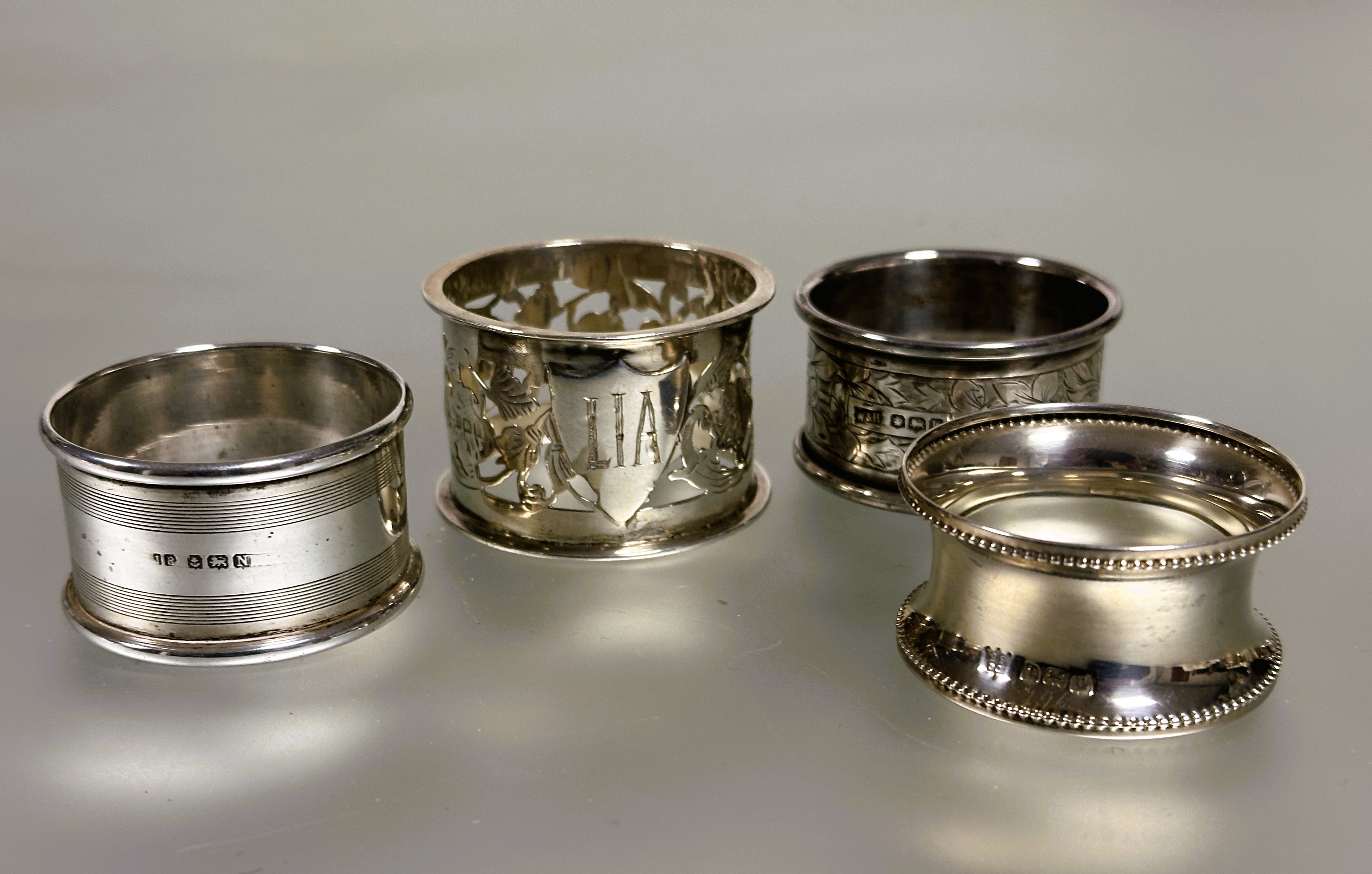 A collection of silver napkin rings to include a pair of Sheffield silver reeded bordered design - Image 3 of 3