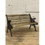 A cast metal and slatted teak three seat garden bench. L126cm.