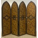 A Victorian Gothic Revival four-arch panel room divider, each panel printed in a floral design