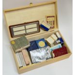 A box of various decks of playing cards and games aides for Bridge etc...
