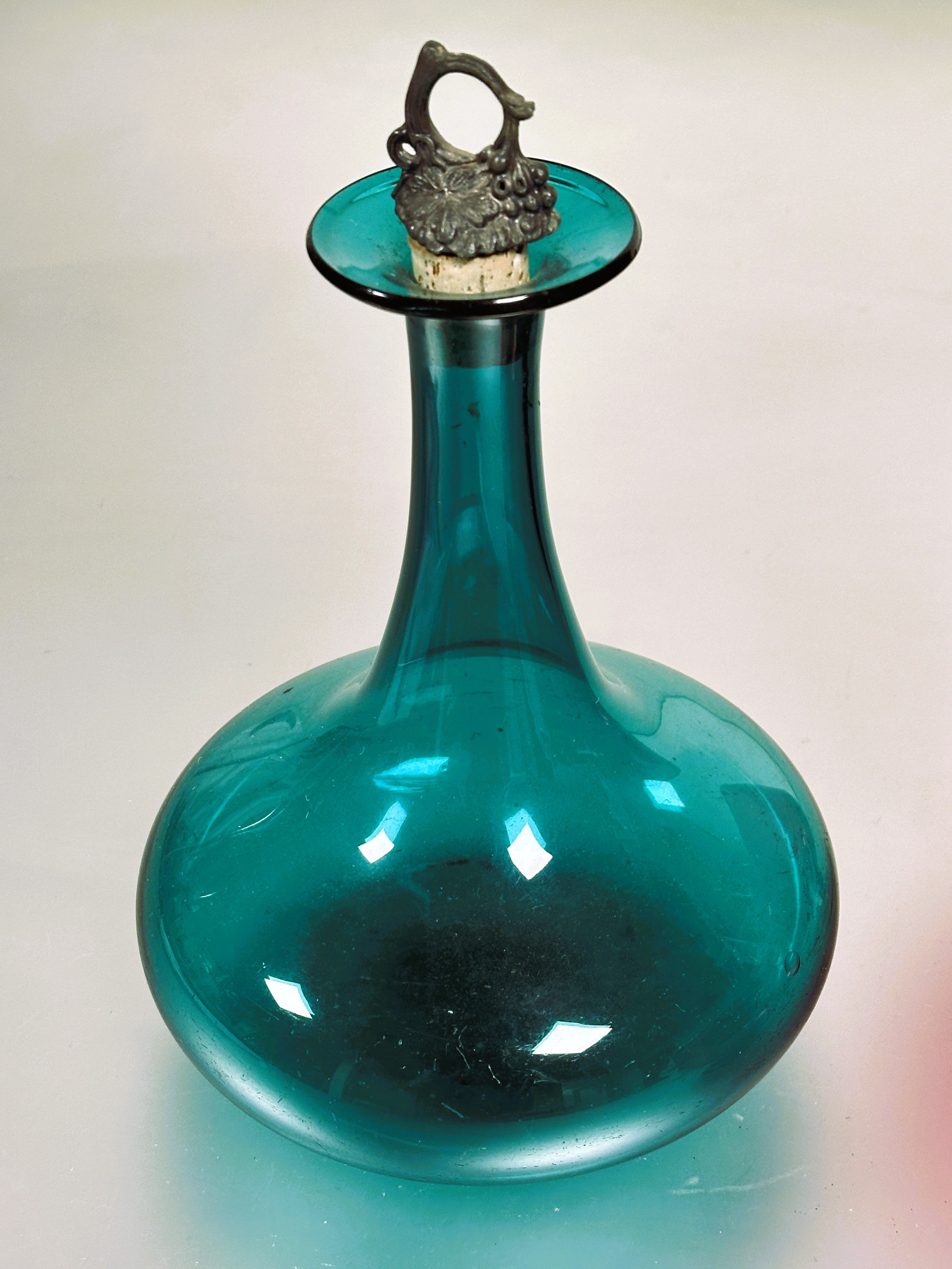 A 19thc green hand blown decanter with bulbous base complete with cork mounted with cast vine - Image 2 of 3