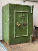A Victorian green painted cast iron safe, Philips & Son, complete with key. H61cm, W44cm, D41cm. (