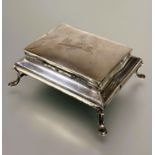 A Edwardian silver rectangular topped hinged jewellery box the top with engraved initials M.E.S.