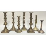 A group of brassware candlestick holders (two pairs, largest h- 28cm) (7)