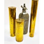 A group of three WWI shell cases 1900 h x 21cm 1901 H x 37.5, 1902 H x 30.5cm and a glass and chrome