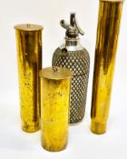 A group of three WWI shell cases 1900 h x 21cm 1901 H x 37.5, 1902 H x 30.5cm and a glass and chrome