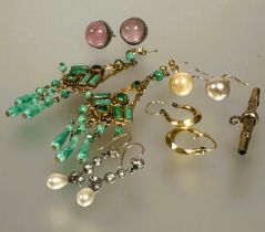 A collection of earrings to include a pair of green gilt metal chandelier style earrings set green