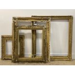 A group of four gilt wood and gesso picture frames, 19th / early 20th century. (a/f) largest 110cm x