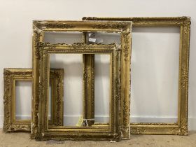 A group of four gilt wood and gesso picture frames, 19th / early 20th century. (a/f) largest 110cm x