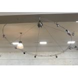 A large contemporary multi-branch pendent light fitting by Stoane lighting. D200cm.