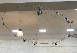 A large contemporary multi-branch pendent light fitting by Stoane lighting. D200cm.