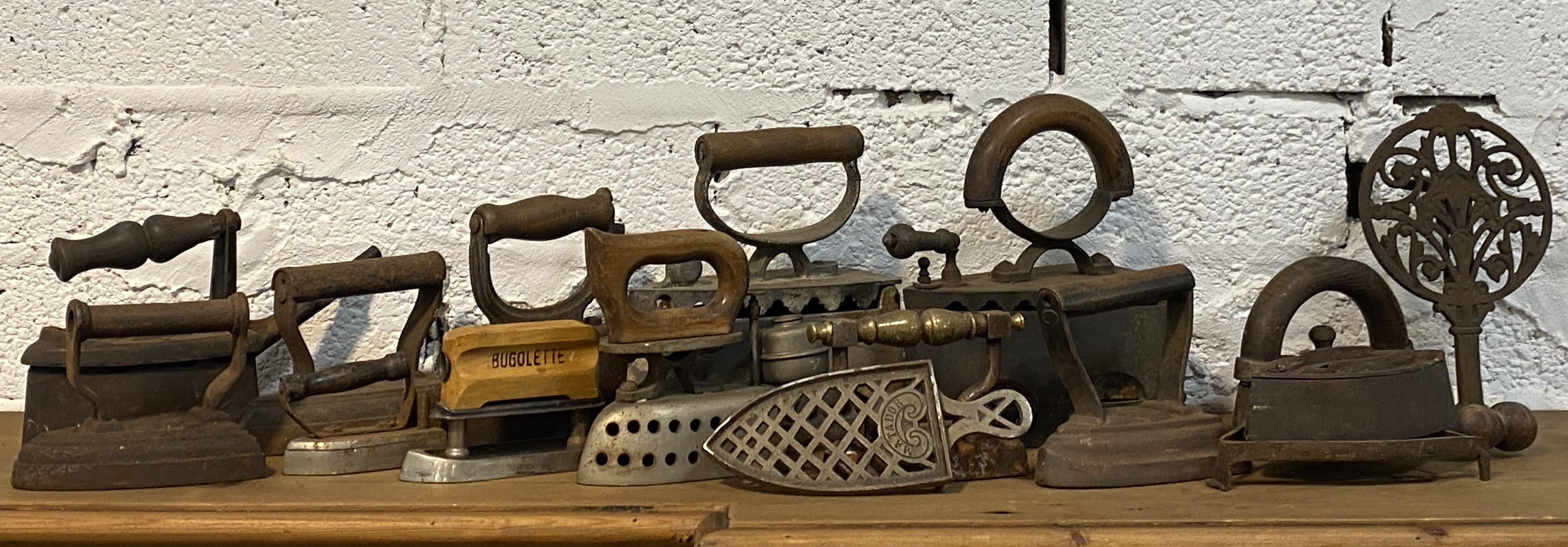 A group of mainly 19th century cast metal flat irons