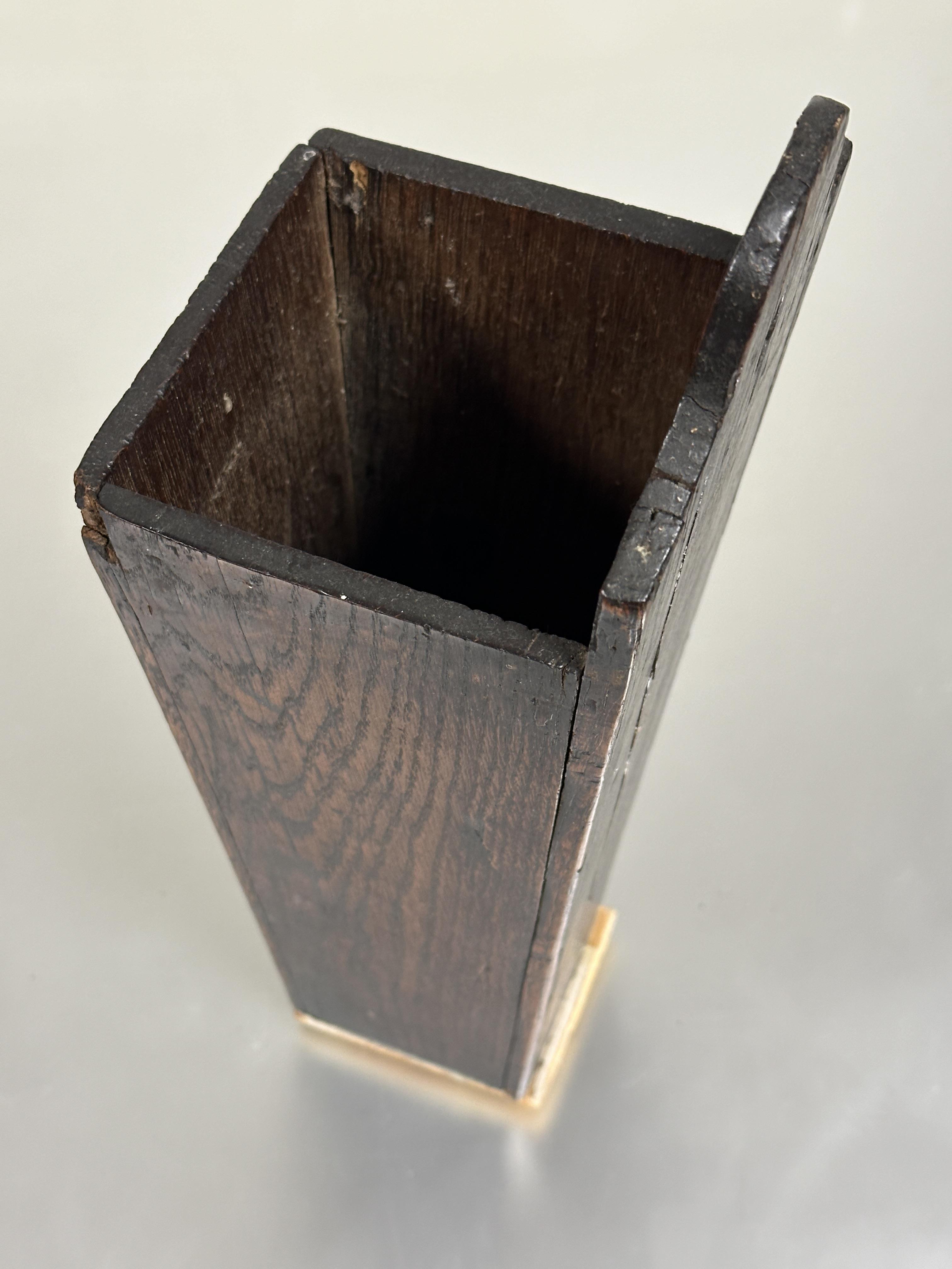 A 18thc oak candle box of tapered form with arched panel back with pierced hole and replaced base - Image 3 of 5