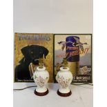 Two reproduction advertising signs (41cm x 32cm) together with a pair of ceramic lamp bases (H27cm)