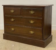 A Edwardian walnut chest the top with moulded edge fitted two short and two long drawers raised on