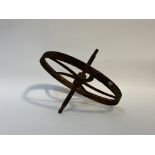 A Cast Iron wheel barrow wheel (shows signs of rust). (w-46cm diameter-22cm)