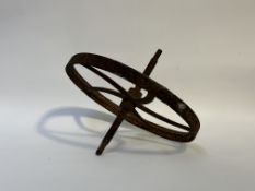 A Cast Iron wheel barrow wheel (shows signs of rust). (w-46cm diameter-22cm)