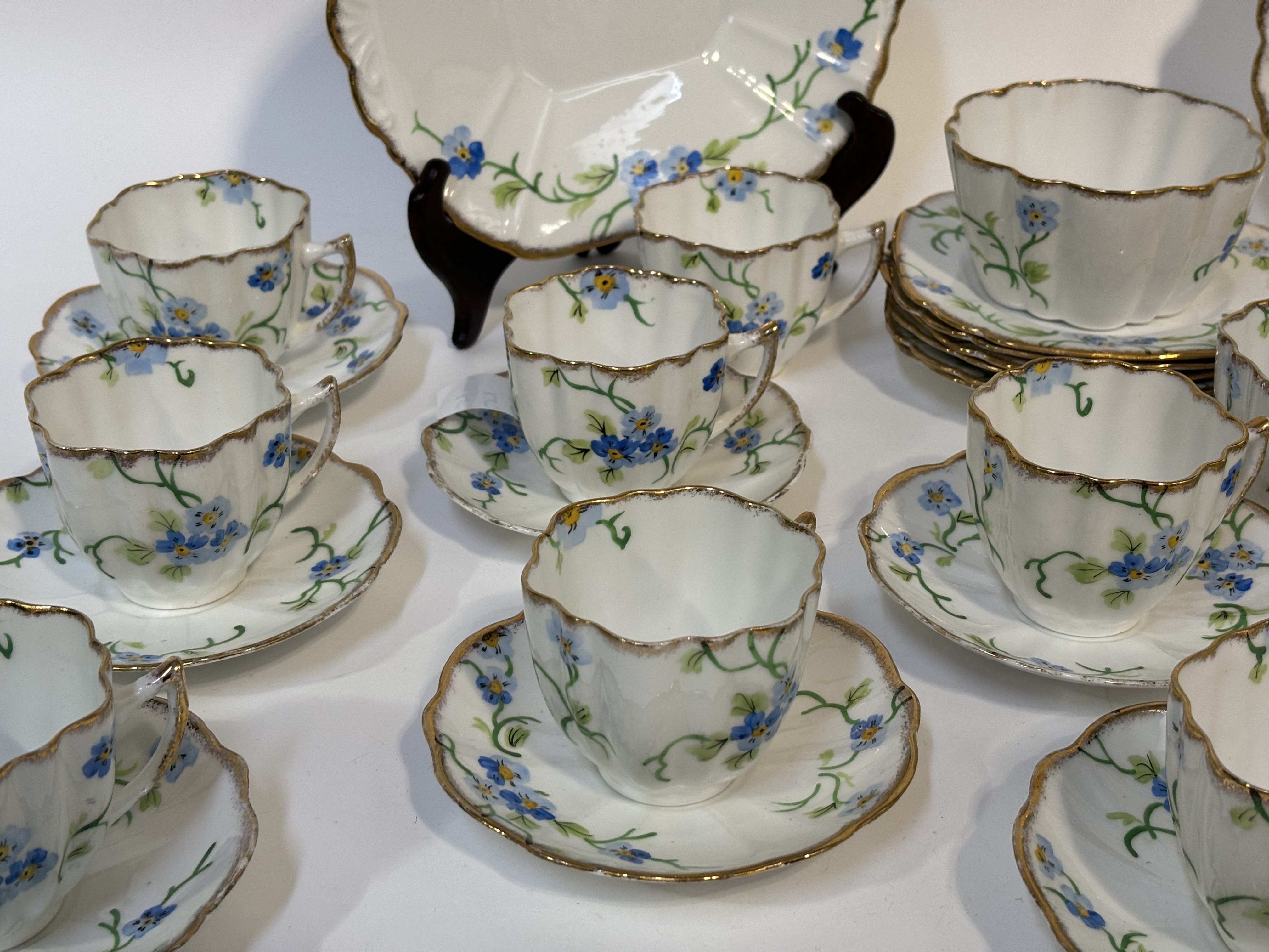 A Melba bone China part tea service  decoration with Forget-me-not's with gilt edging, comprising, a - Image 3 of 3