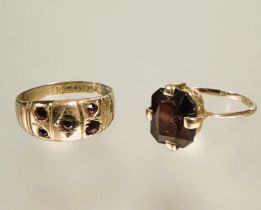 A 9ct gold cushion cut garnet set ring a/f O and a 9ct gold five stone garnet set ring O 3.79g (2)