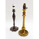 A 1920s gilt wood tapered baluster candle stick table lamp raised on circular weighted base H x 36cm