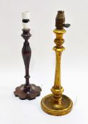 A 1920s gilt wood tapered baluster candle stick table lamp raised on circular weighted base H x 36cm