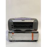 A Cannon MP270 printer, together with an Epson printer. (2)