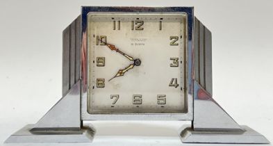 An Art Deco chrome plated clock with 8 Day movement, retailed by Brook and Son of Edinburgh, the
