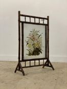 A Victorian bamboo framed fire screen, the glazed panel hand painted in a floral design. H93cm.