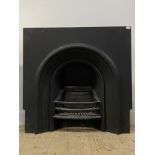 A large Victorian cast iron fire insert. H99cm, W102cm.