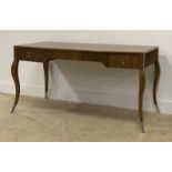 A contemporary oak knee hole desk, the rectangular top above a reeded frieze fitted wit two drawers,