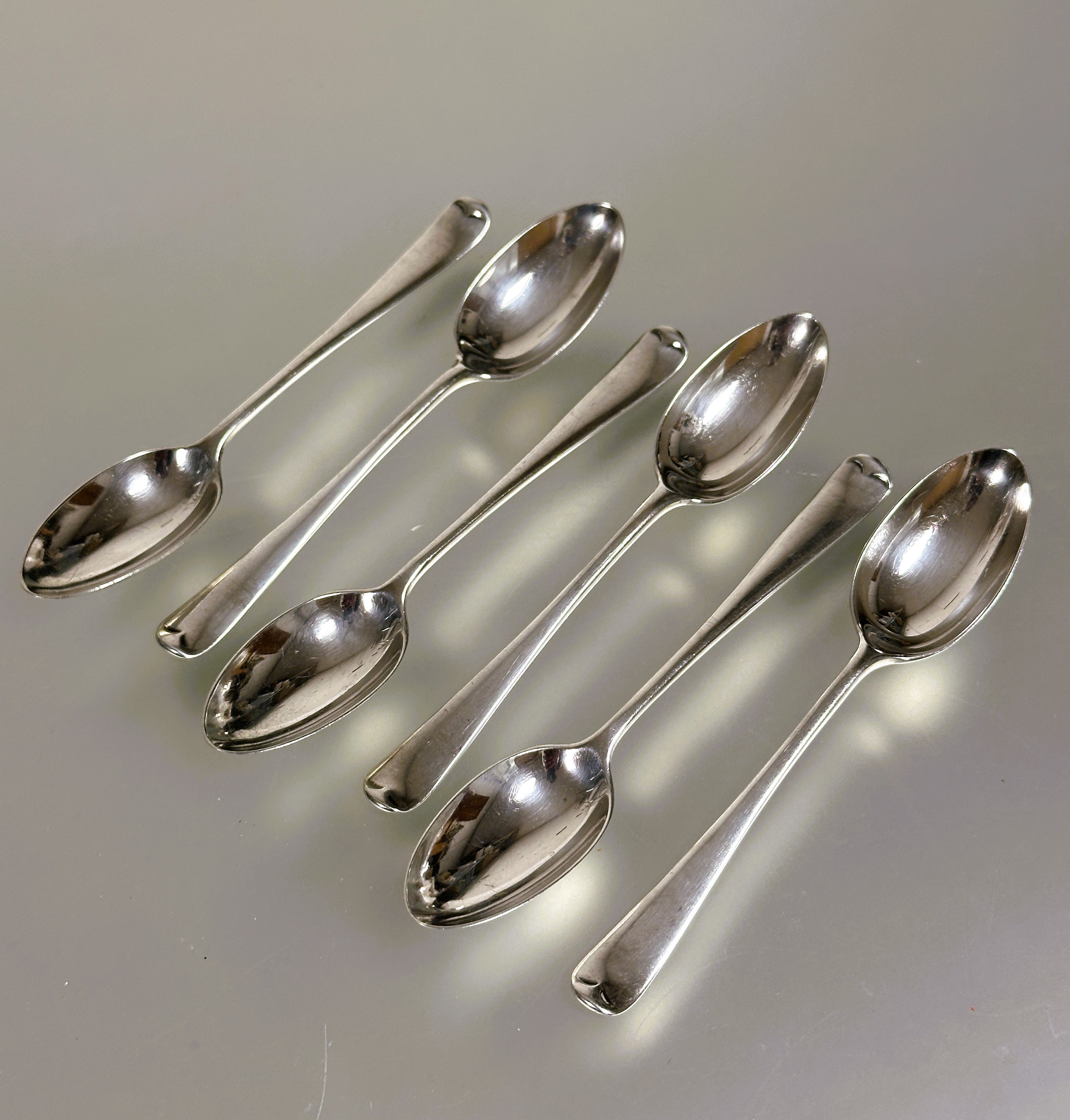 A set of six London silver old english pattern tea spoons London 1920 L x 10cm 67.6g (6)