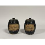 A pair of Scottish Pottery barrels with covers, both reading "Mrs.Simpson" to centre. ( chips to