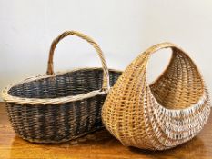 A vintage crescent shaped wicker egg basket H x 31cm L x 37cm and a oval two tone wicker loop handle