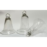 Three nineteenth century glass smoke bells/catchers (largest h- 16cm, one chipped)