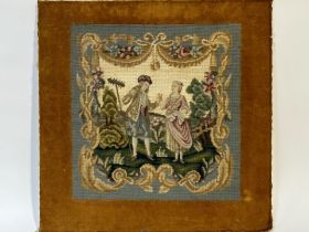 A 19hc style needle-point tapestry of a man courting a woman with a brown fabric boarder on board,