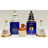 Four bottles of Bell's commemorative whisky comprising a 1981 Charles and Diana 75cl bottle, a