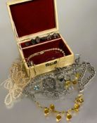 A box containing a collection of costume jewellery to include silver curb link bracelet with heart
