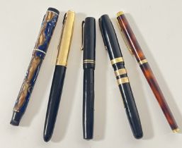 A group of five vintage pens comprising a faux tortoiseshell Parker pen, a Parker 51, a Swan auto-