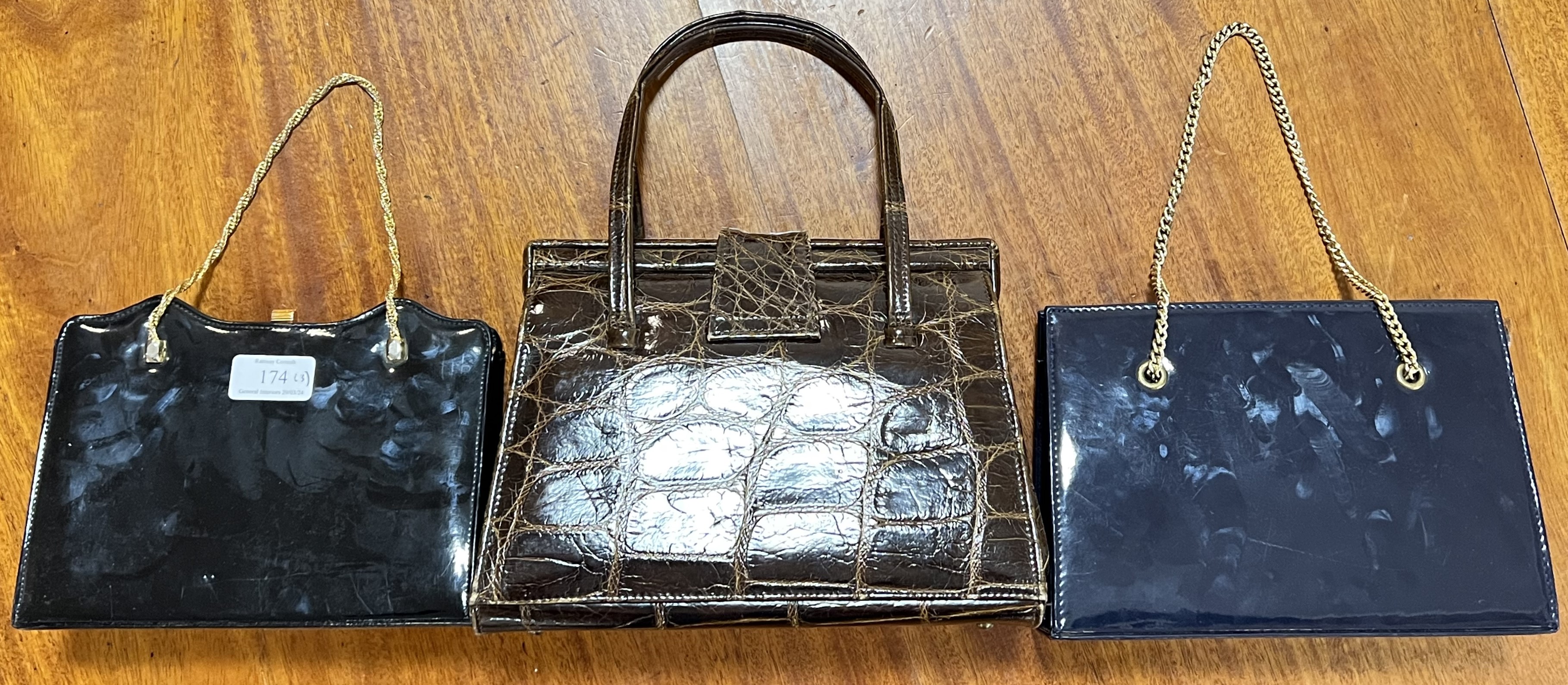 Three vintage ladies' handbags comprising an embossed leather Widegate bag (w- 26cm), a black