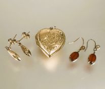 A 9ct gold engraved heart shaped locket H x 2.5cm and a pair of 9ct gold teardrop style earrings L x