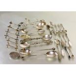 A collection of Epns flatware pair vine handled fruit spoons, a pair of ball pattern salad