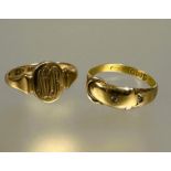 A 18ct gold buckle style ring set two clear stones L / M 1.4g and a 9ct gold oval signet ring with