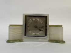 A 1950's green and white Onyx mantel clock in the Art Deco style by Elliott, the silvered dial