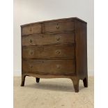 A Regency mahogany bow front chest, fitted with two short and three long drawers, raised on